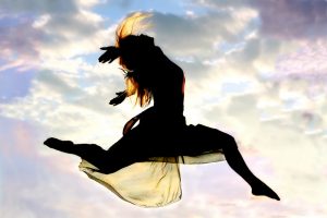 Woman Leaping Through The Air